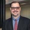 Portrait of Tom Pace, Associate Professor at John Carroll University